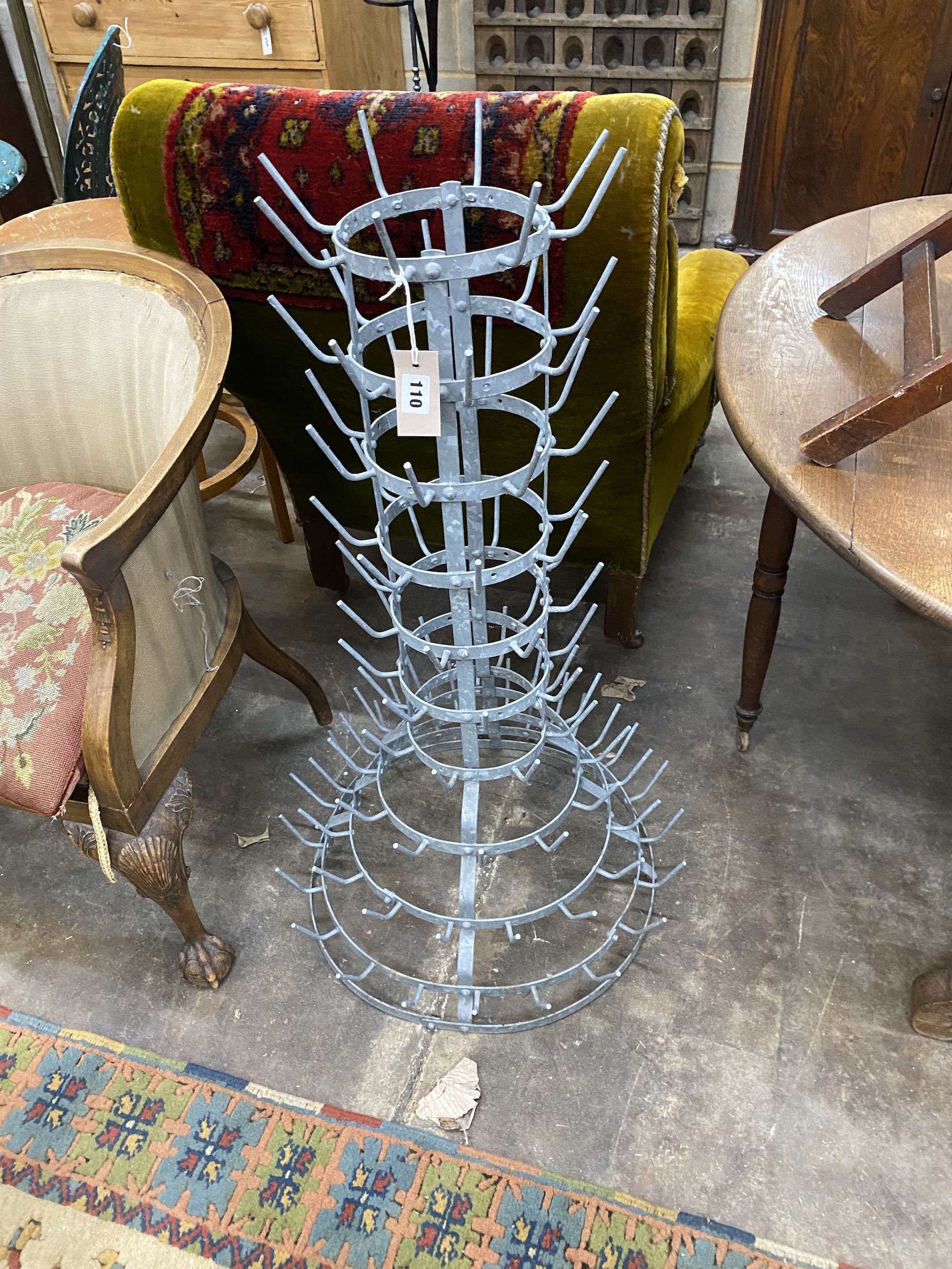 A French galvanised wine bottle drying rack, height 100cm